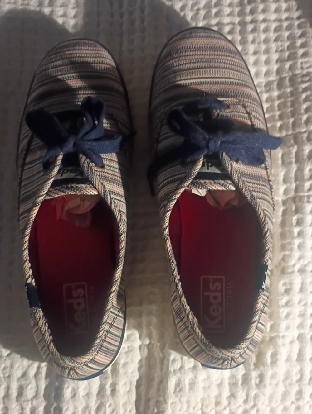Keds  Women's Navy Stripe Canvas Sneakers with Red Insole